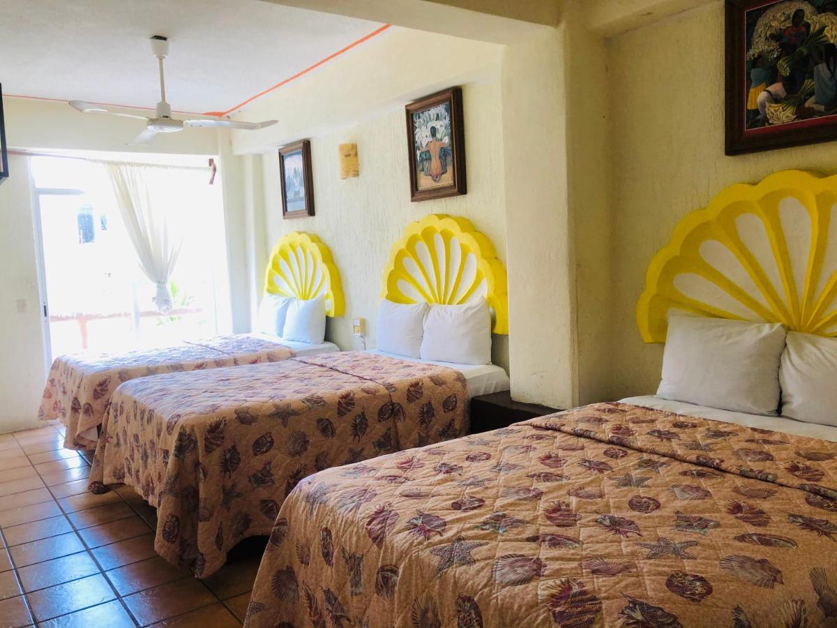 Hotel Playa Santa Cruz By Rotamundos Huatulco ภายนอก รูปภาพ