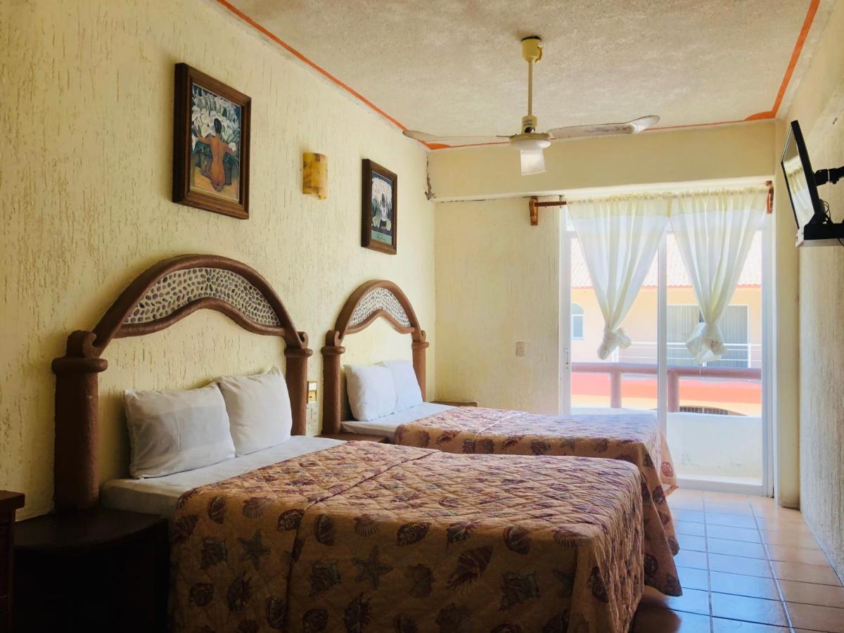 Hotel Playa Santa Cruz By Rotamundos Huatulco ภายนอก รูปภาพ