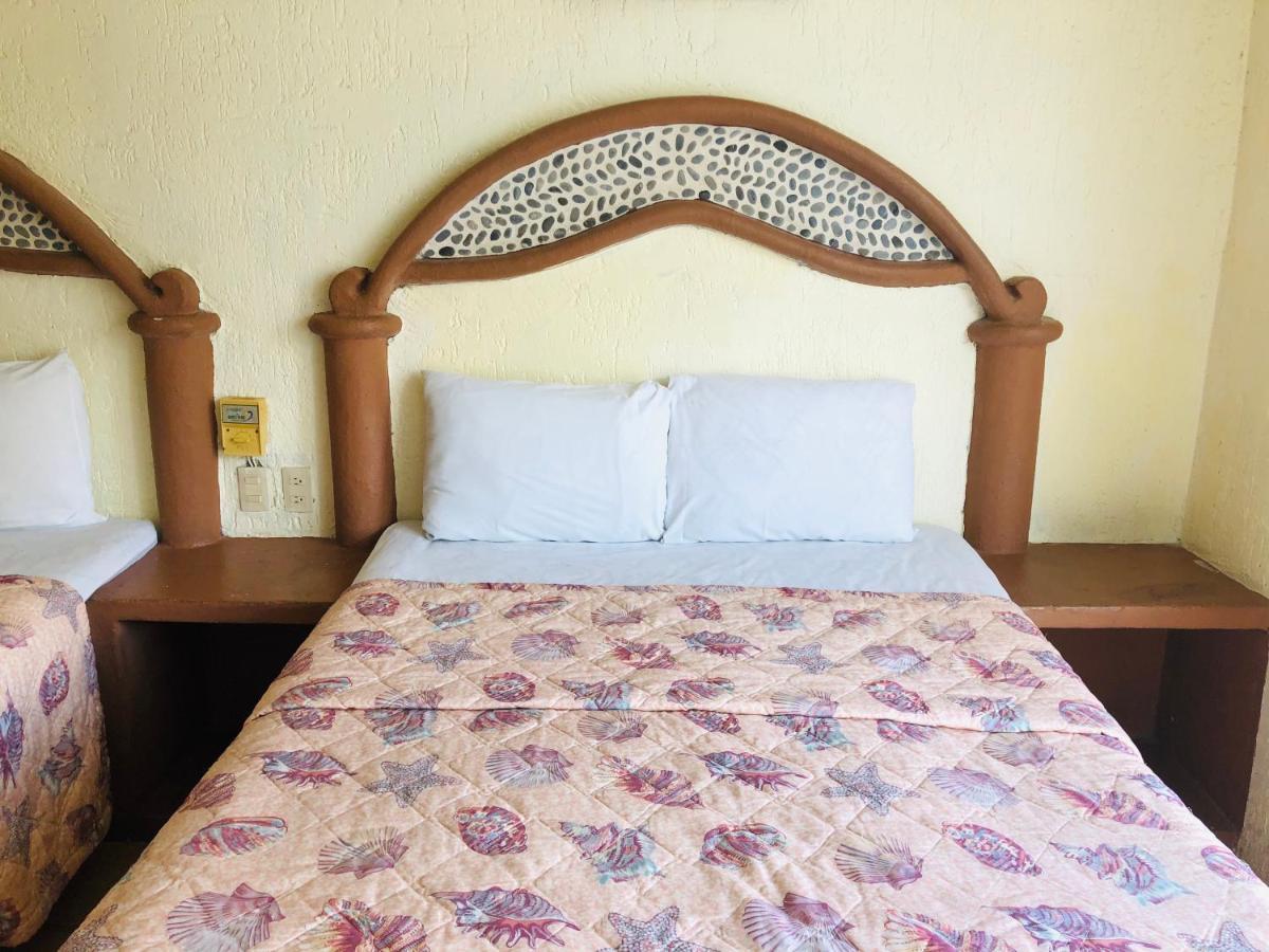 Hotel Playa Santa Cruz By Rotamundos Huatulco ภายนอก รูปภาพ