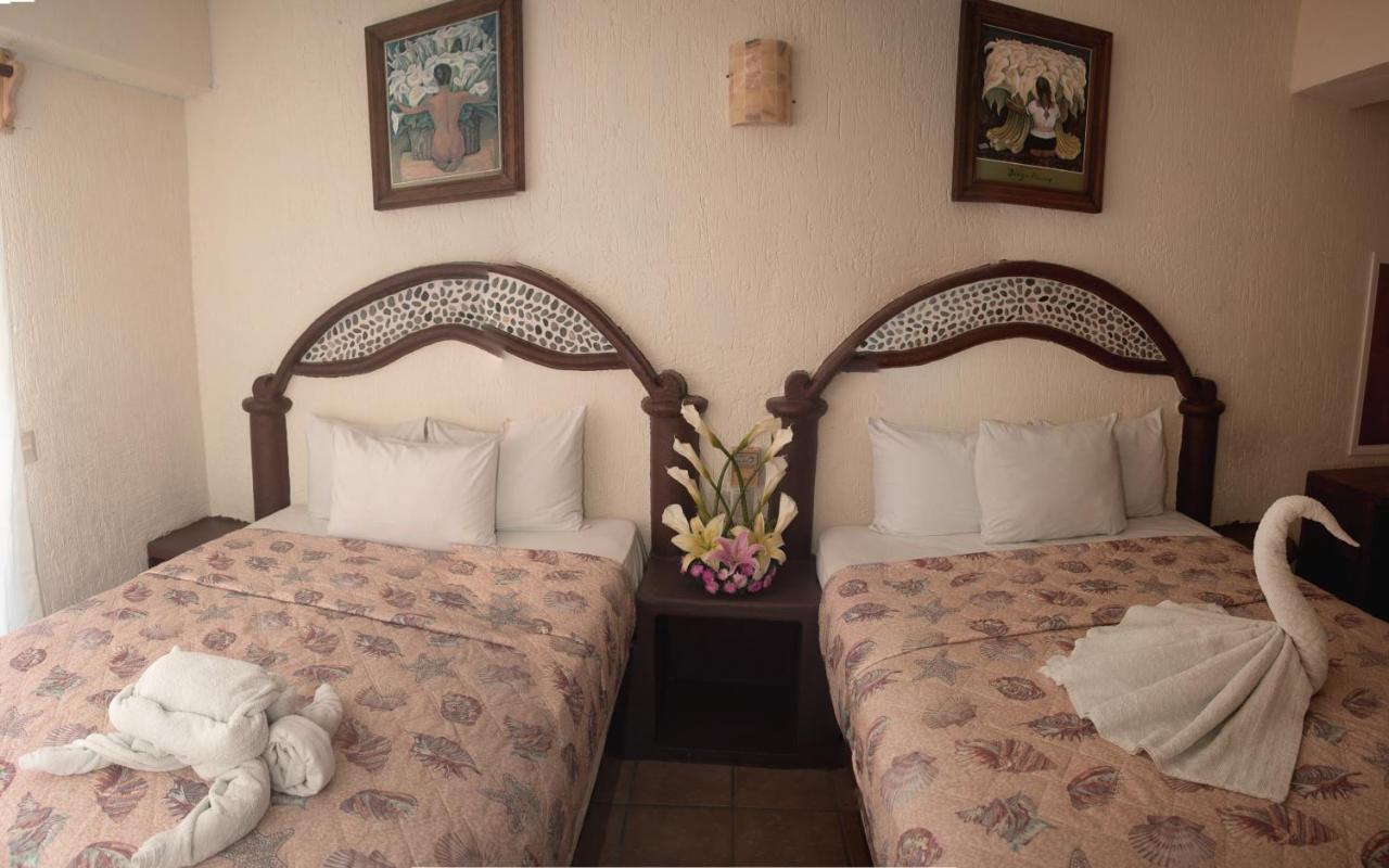 Hotel Playa Santa Cruz By Rotamundos Huatulco ภายนอก รูปภาพ